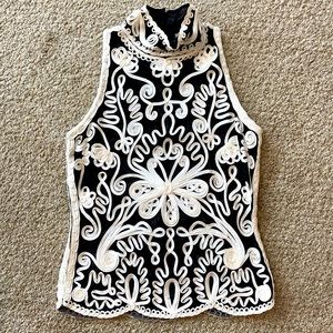 Cache mock-neck sleeveless black mesh tank with ribbon stitching overlay